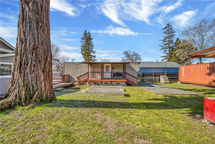 *The large redwood in the backyard was taken down March 2024.