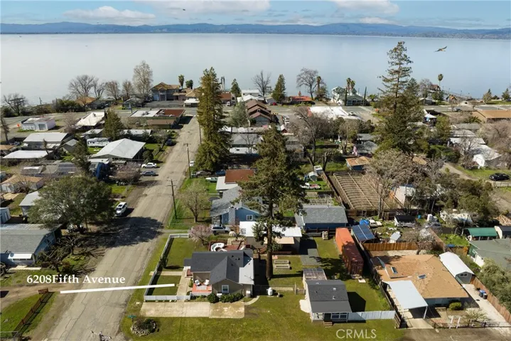 *The large redwood in the backyard was taken down March 2024.