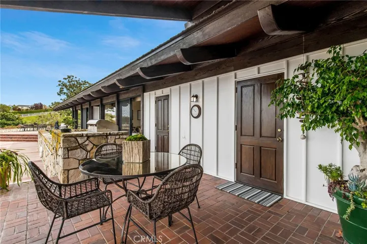 View of the outdoor patio and barbeque area
