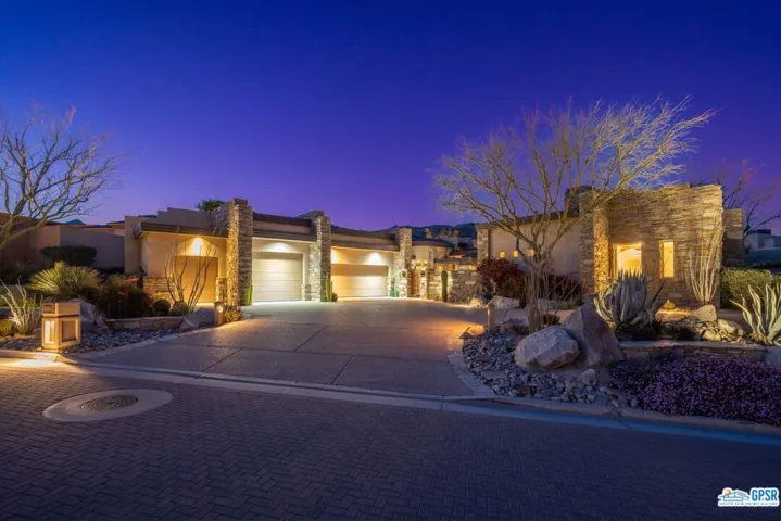 Evening view of property