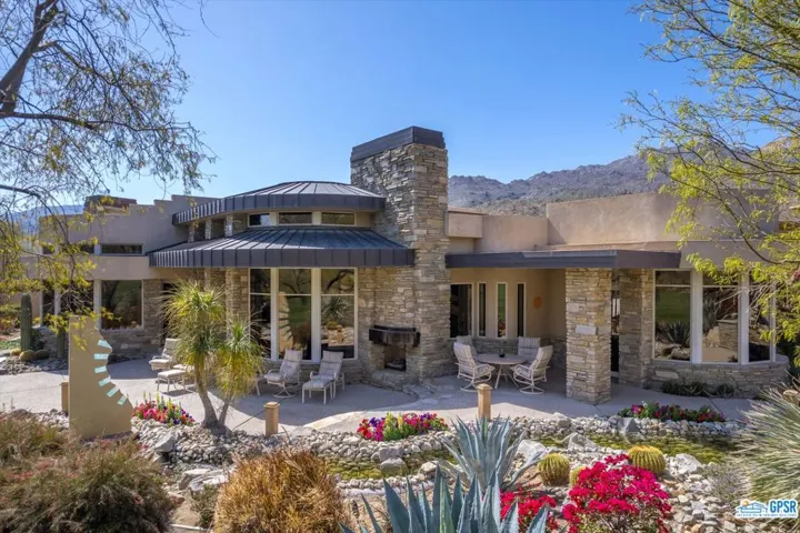 Rear of property with long patio