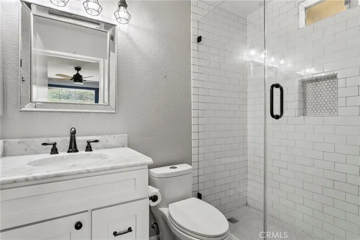 Enjoy the beautiful walk in shower in the bathroom connected to the primary bedroom.