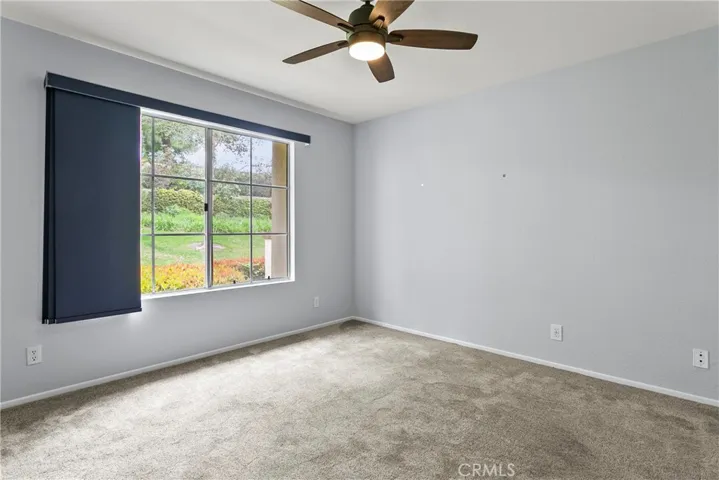 Both bedrooms have sliding panel curtains.