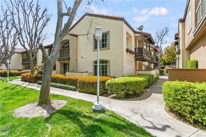 The condo is an end unit located next to a greenbelt