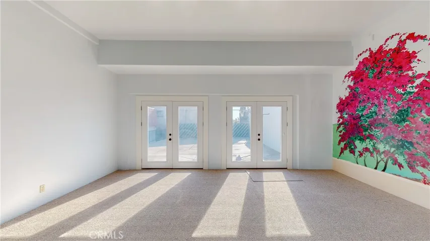 Previously an indoor pool, this room was created by adding a floor over the pool