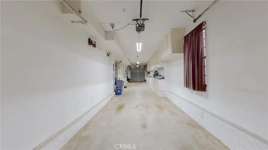This is one of 2 garages with direct entry to the home. This will fit up to 4 small cars, too.