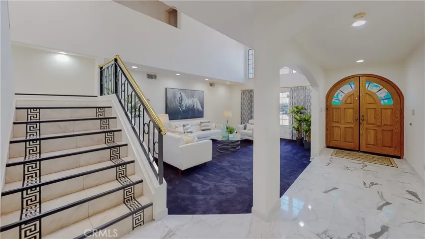 Double wide staircase and double entry doors