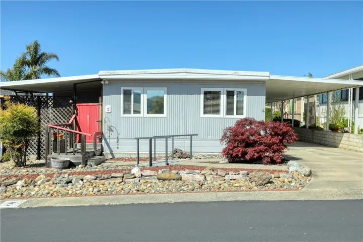 Double wide with 13.5 X 20 addition and room for 3 vehicles in driveway.