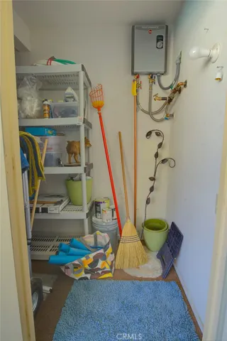 Storage room with Tankless Water Heater