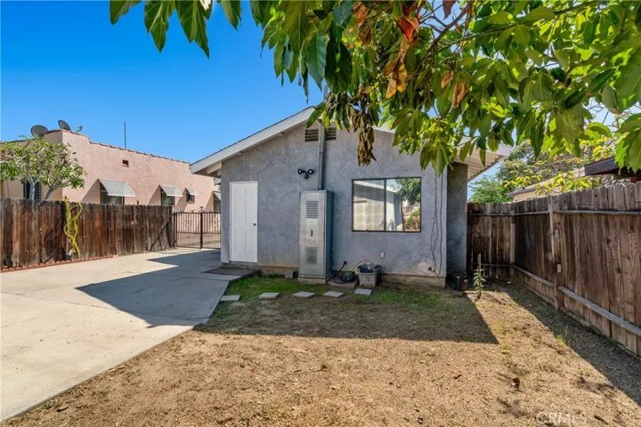View of the Driveway and the Back Yard