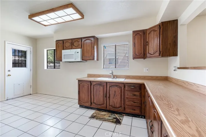 Spacious Kitchen with access to Back Yard
