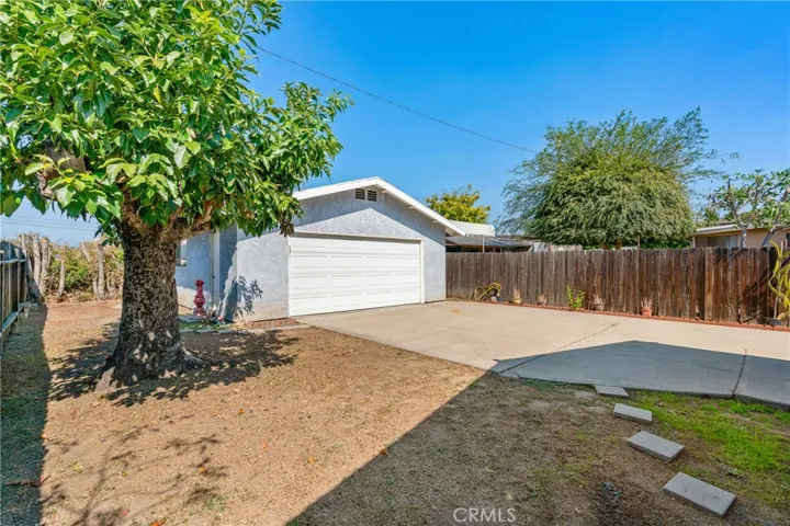 View of the Back Yard and Two-Car Detached Garage