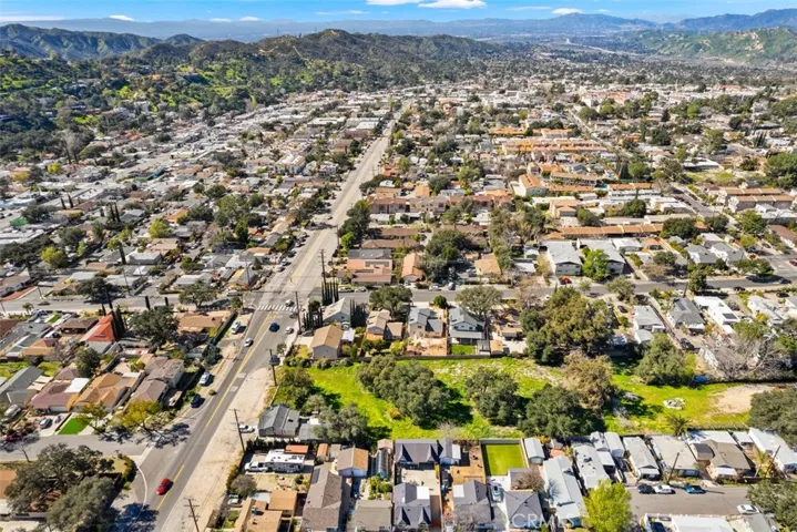 Extended aerial view of the lot within the community.