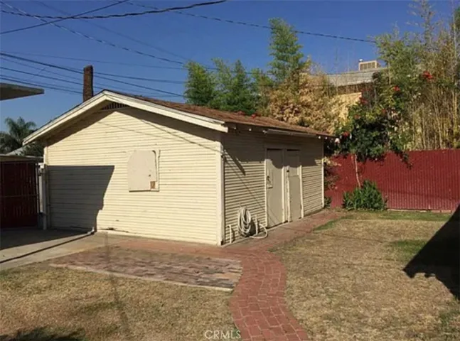 garages and unit 2 yard (picture from previous listing)