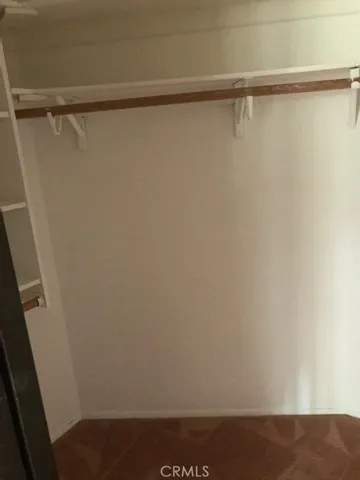 PRIMARY BEDROOM WALK-IN CLOSET