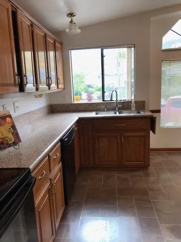 KITCHEN TOWARD FRONT OF HOME