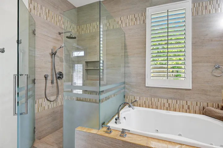 PRIMARY SHOWER AND TUB MLS