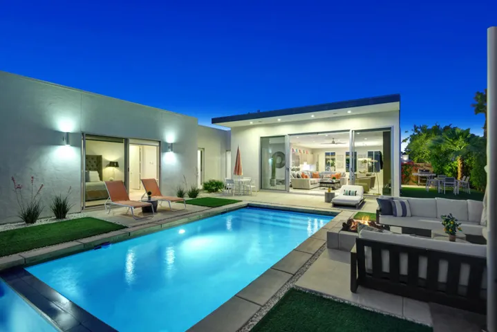 POOL AND FIRE PIT TO HOUSE NIGHT