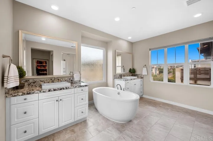 Primary Bath with Separate Vanities & Free Standing Soaking Tub
