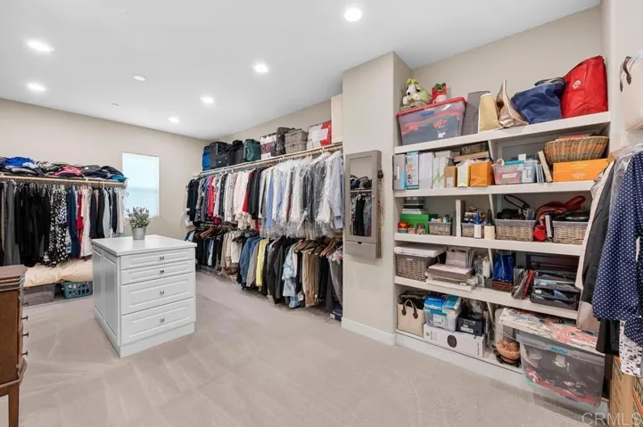 HUGE Walk-in Closet with Built-in Dresser/Drawers & Shelving in Primary Bedroom
