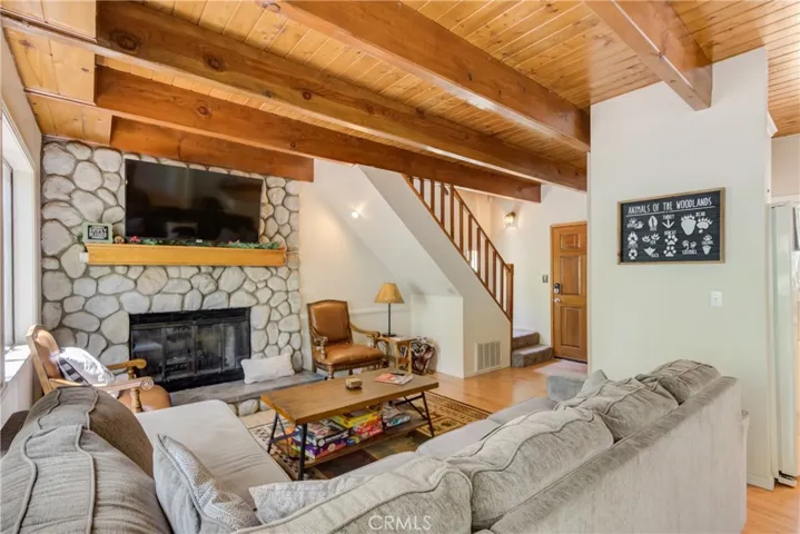 Great room showing fireplace and entry.