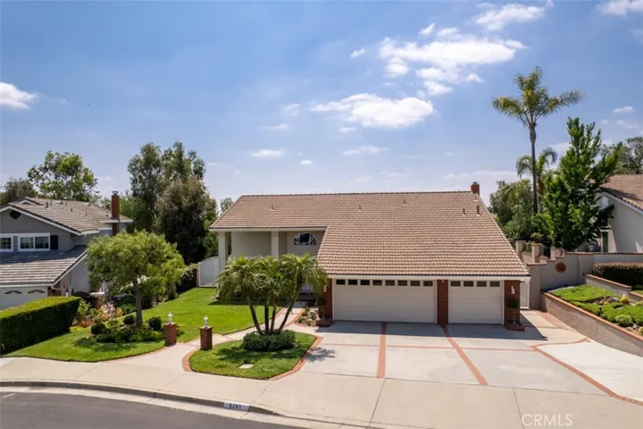 Spacious driveway. 3-car garage. Be sure to take a look in the garage: recessed lights, built-in speakers, attic storage, and more.