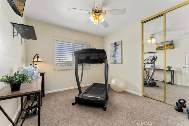 Bedroom 3 is currently used as a workout room. Dimensions approx 10'x10'