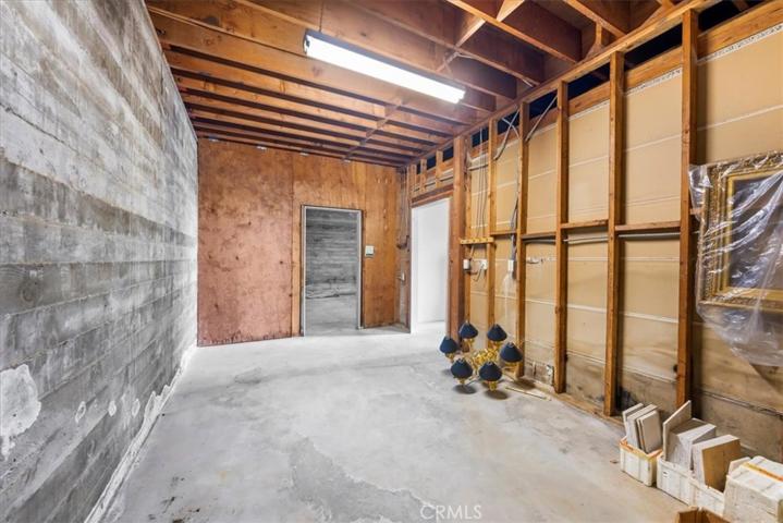 1 of 3 rooms below garage. High ceilings, above ground.