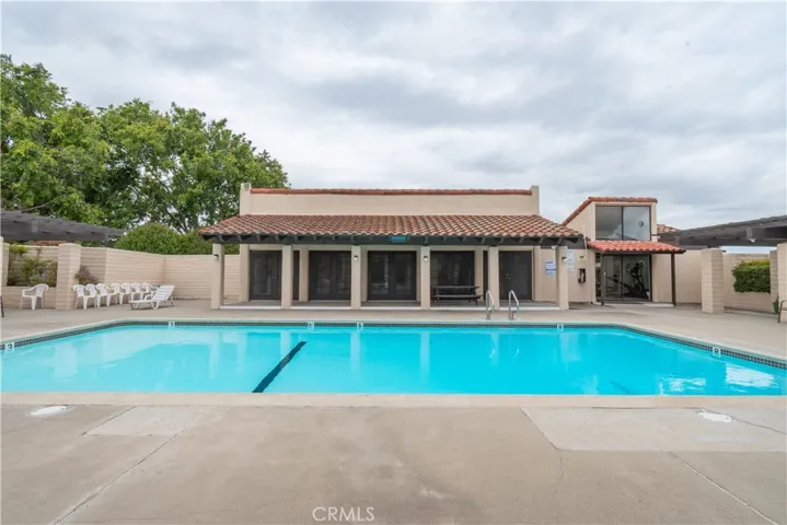 View of swimming pool and clubhouse