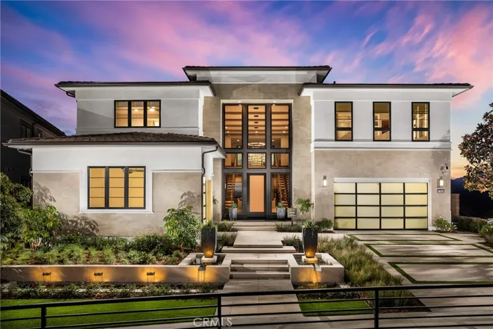 Front Elevation: Sunset Coastal Contemporary - Skyline Collection
INCLUSIONS: Fully Furnished model home, professionally decorated with designer finishes throughout and lush landscaping. 
EXCLUSIONS: Model home sold as is.
