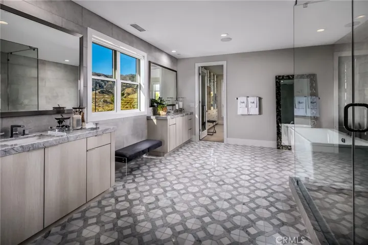 Primary Bath: Sunset Coastal Contemporary - Skyline Collection
INCLUSIONS: Fully Furnished model home, professionally decorated with designer finishes throughout and lush landscaping. 
EXCLUSIONS: Model home sold as is.