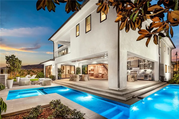 Rear Elevation: Sunset Coastal Contemporary - Skyline Collection
INCLUSIONS: Fully Furnished model home, professionally decorated with designer finishes throughout and lush landscaping. 
EXCLUSIONS: Model home sold as is.