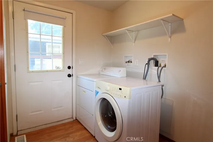 Indoor laundry room just off kitchen