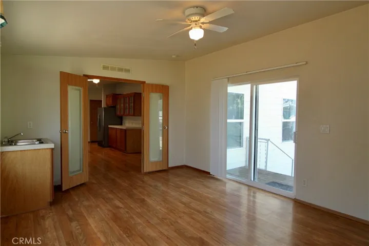 Separate eating area with wet bar off kitchen