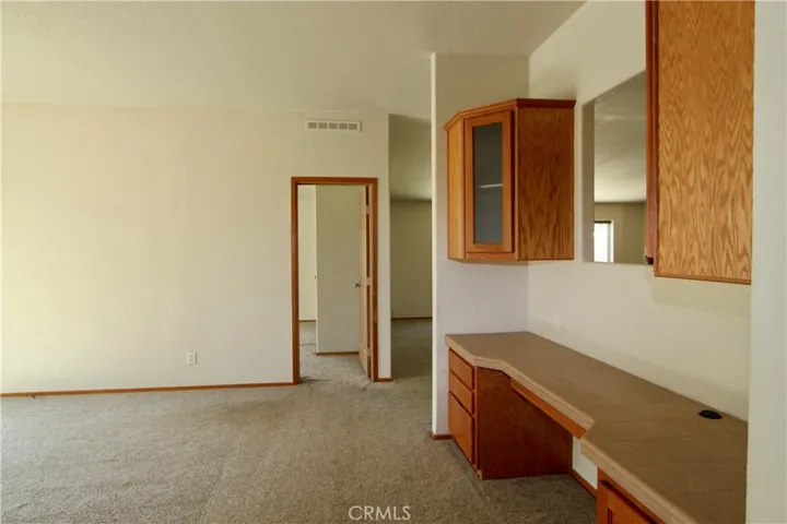 Family room with build in desk/office space