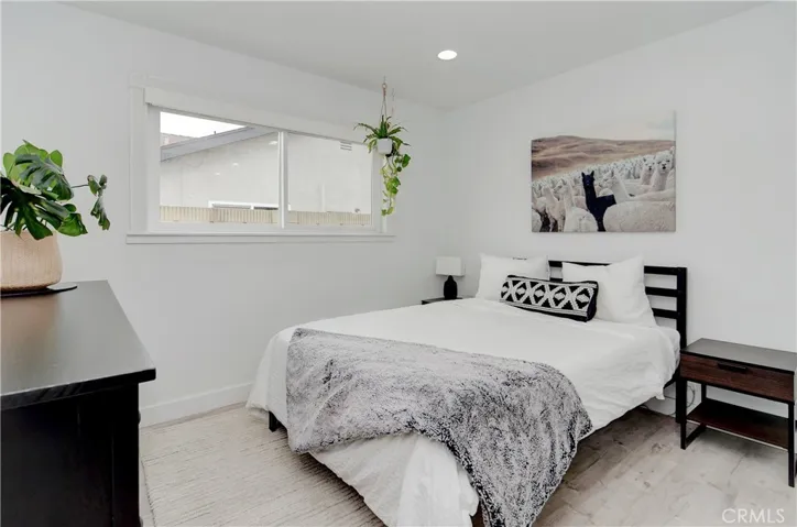 Guest Bedroom 1. Dual pane temperature windows with custom fitted black out shades