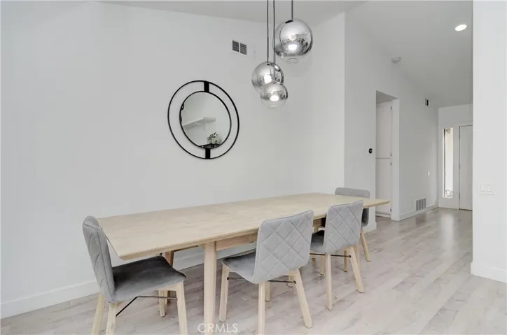 One of many modern light fixtures throughout home