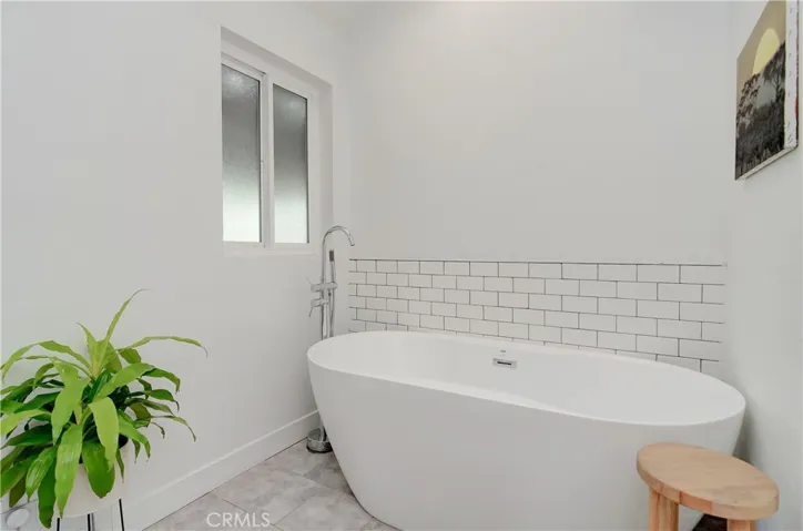 Japanese soaking tub with sunlight with a spa-like atmosphere