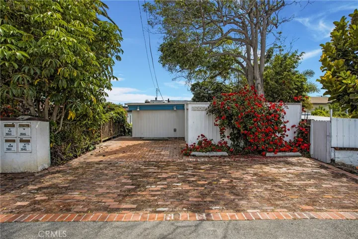 Front of cottage with 2 designated parking spaces.