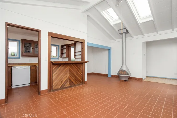 Breakfast bar, nook and cozy fireplace