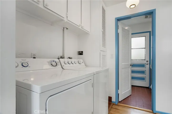 Laundry area between Living room and bedrooms
