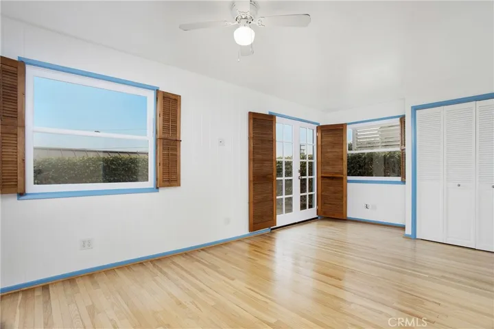 Primary bedroom with French Doors out to spacious deck