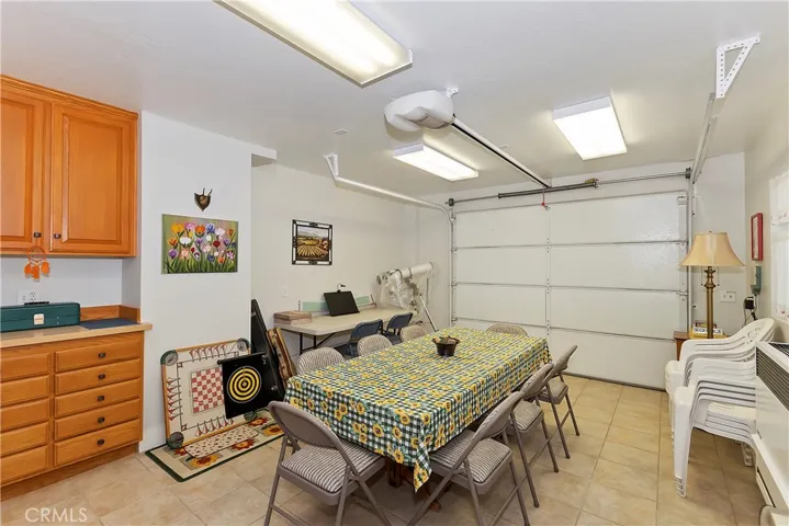 Garage With It's Own Heat Source. Currently Used For A Game Room And Extra Seating For Dining