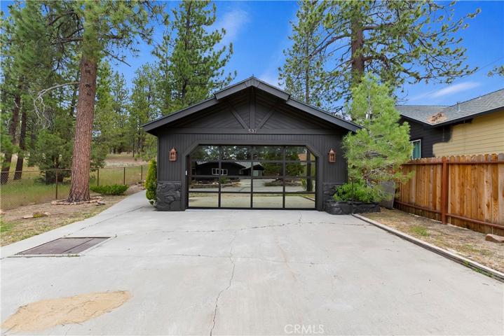 Mirrored garage door, private driveway