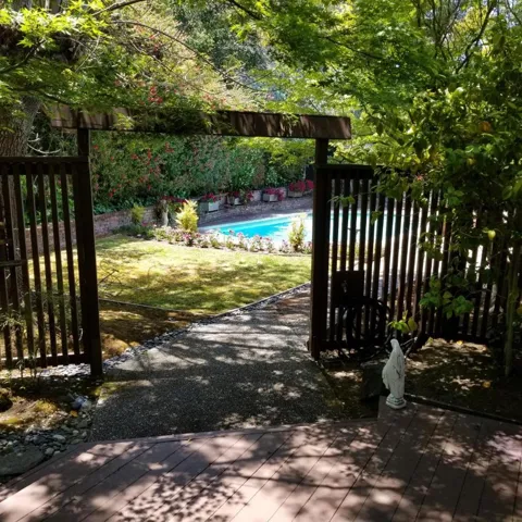 Private Yard Outside Master Bedroom leads to Pool and Yard