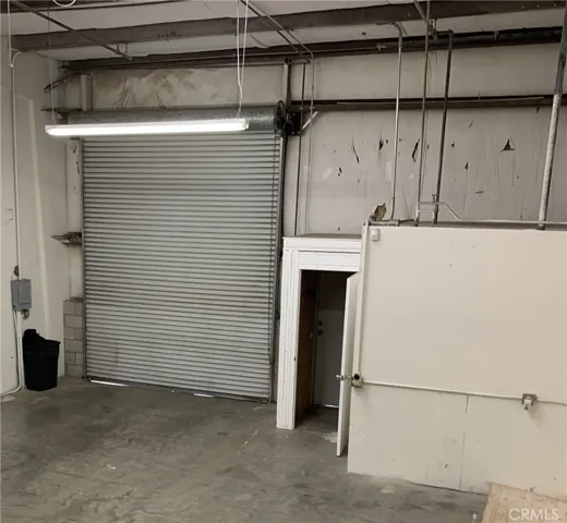 1116 facing roll up door and bathroom
