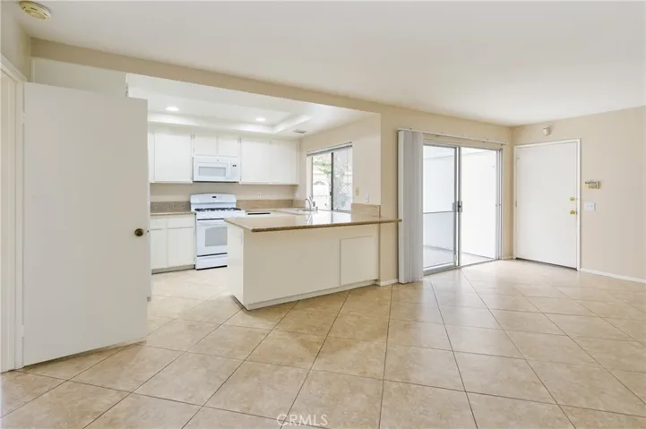 Family room sliding door leads to the backyard