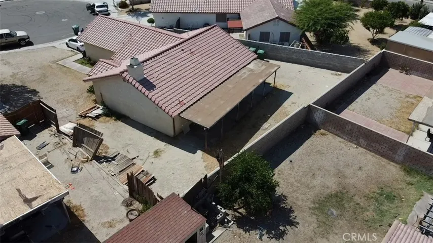 Neighbors fence has fallen into the yard