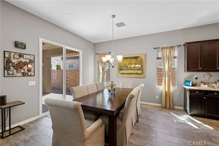 Sliding glass door out to covered patio area