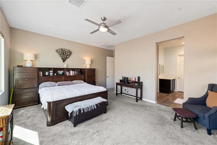 Ceiling fan in primary bedroom